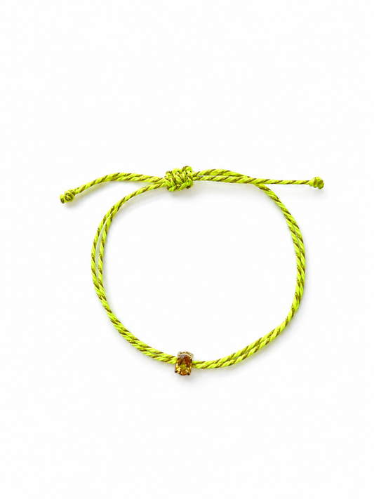 Orange sapphire oval silk cord bracelet