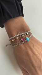 Silk cord bracelet with tourmaline heart
