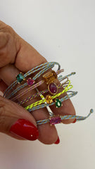 Silk thread bracelet with oval ruby cabochon