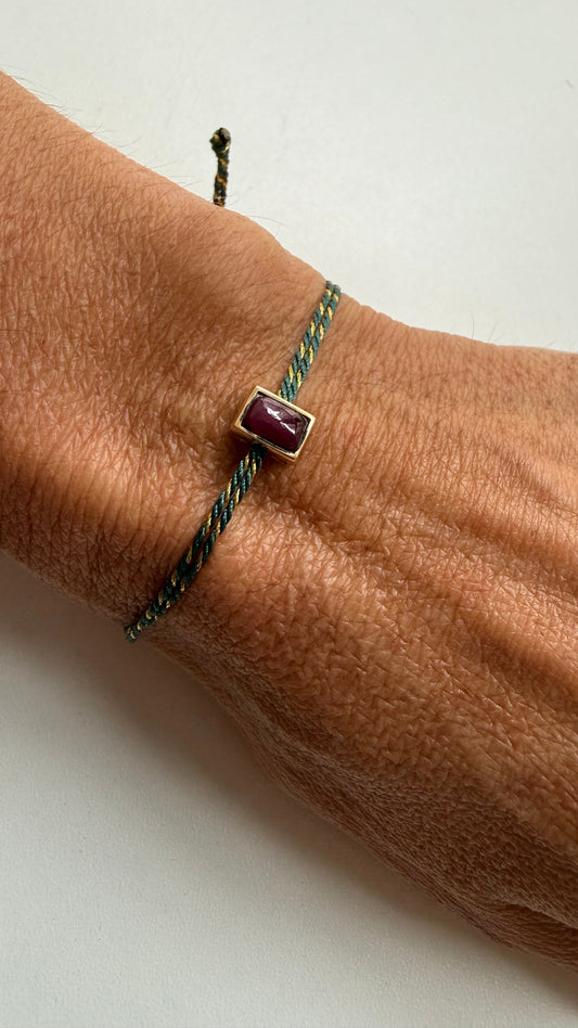Silk cord bracelet with 4x6mm rubies